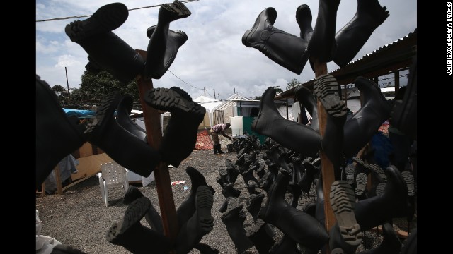 Sanitized boots dry at the Doctors Without Borders treatment center in Paynesville on October 5.