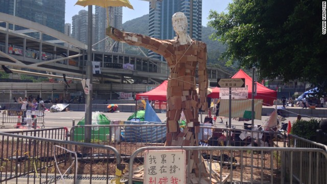 The statue "Umbrella Man," by the Hong Kong artist known as Milk, stands at a pro-democracy protest site in the Admiralty district on October 6.