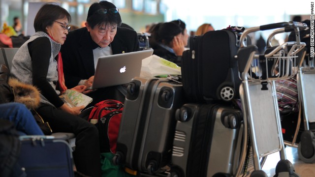 Watching a movie on your laptop before your flight? That's what headphones are for.