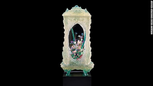 The pale green case for this work resembles fine jade, but it is made out of polyester resin.