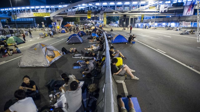 Pro-democracy protesters remain scattered at the protest site in Admiralty on Thursday, October 9. The government canceled talks that day after protest leaders urged supporters to keep up the occupation. 