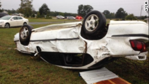 A car is damaged after severe weather passed through Little River County, Arkansas, on Monday.
