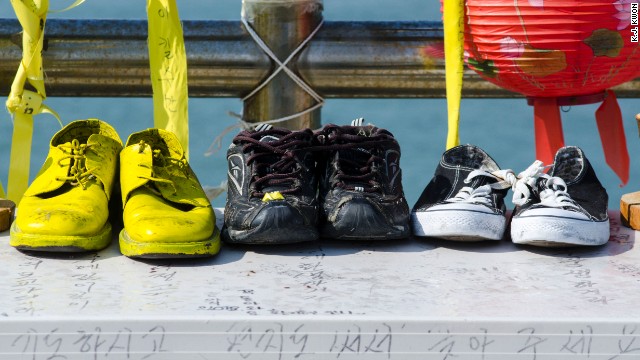 Shoes believed to belong to the missing and the deceased are on display at the harbor.