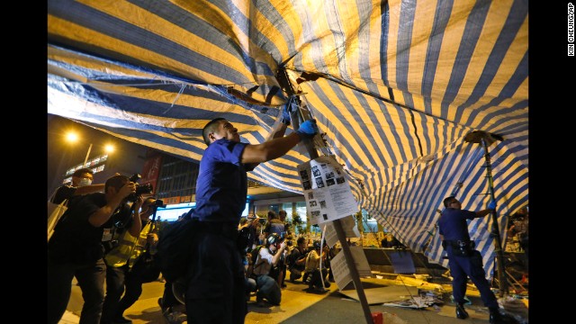 Riot police remove barricades on October 17.