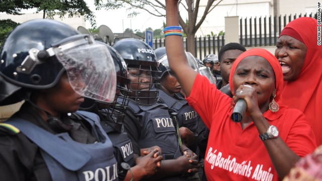 Police in riot gear block a route in Abuja on October 14, during a demonstration calling on the Nigerian government to rescue schoolgirls kidnapped by Boko Haram. In April, more than 200 girls were abducted from their boarding school in northeastern Nigeria, officials and witnesses said.