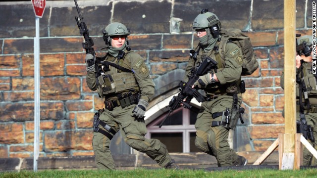 Royal Canadian Mounted Police respond to the reported shooting at Canada's Parliament.