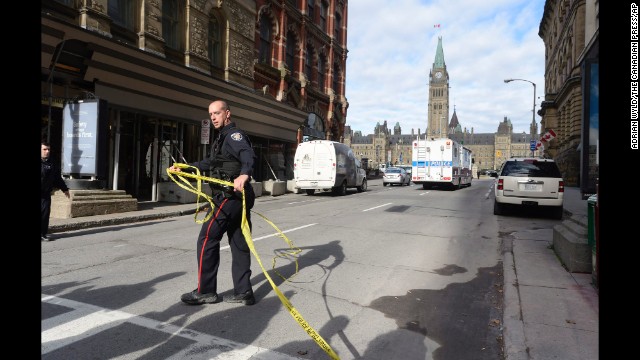 Police cordon off a street leading to Parliament Hill.