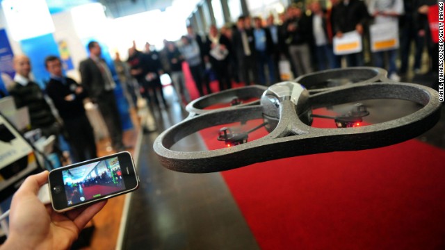 By 2010, drones being exhibited at major high-tech conventions included the ability to monitor the camera's output wirelessly -- and in real-time -- using cellphones.