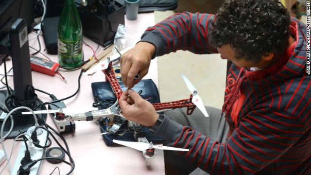 Increasingly, pro athletes are using drones for their own benefit. French snowboarder Xavier de le Rue is pictured working on a drone prototype in the summer of 2014.