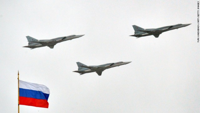 Russian Tupolev Tu-22M supersonic strategic bombers fly above the Kremlin in Moscow, on May 7, 2014.