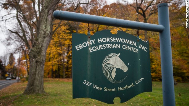 The group's equestrian and agricultural center is nestled inside a 693-acre park. Complete with a horse stable, riding arena and an ice cream parlor, it's a far cry from the dilapidated homes and boarded up school buildings that lie just beyond its gates.