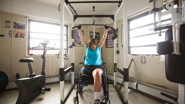 Norton's strength-training equipment is specially adapted to fit his clients' needs. Most of the people he trains are in wheelchairs and rely on their upper body strength to get around.