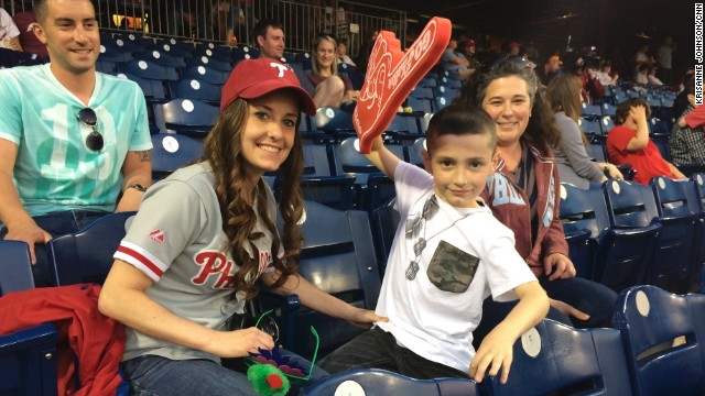 Ross helps prepare families for Phillies games by providing booklets illustrating each step of the game. She also escorts families to their first game, and each family is paired with a clinician should additional support be required.