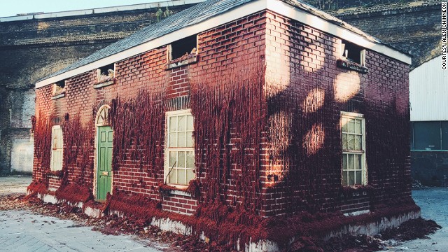 British artist Alex Chinneck creates playful architectural illusions in highly visible spaces. <i>A Pound of Flesh for 50p</i>, a full-scale house made of wax bricks installed in Southwark, is one of his most recent projects.