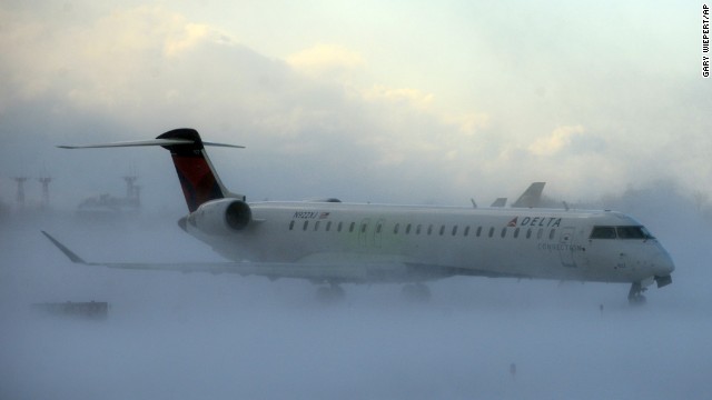 A plane negotiates its way through the snow at Buffalo Niagara International Airport on November 18. All 50 states registered temperatures below freezing Tuesday morning.