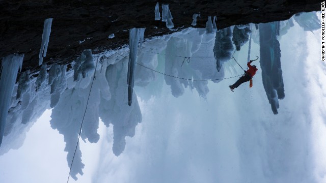 Ice climber Will Gadd ascends Helmcken Falls at Wells Gray Provincial Park in British Columbia, Canada. The 450-foot cascade never fully freezes, but it leaves a blanket of ice on the surrounding walls. It's considered one of the world's most difficult climbs.