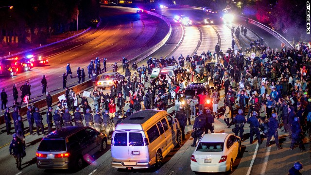 Protesters block Interstate 580 in Oakland on November 24.