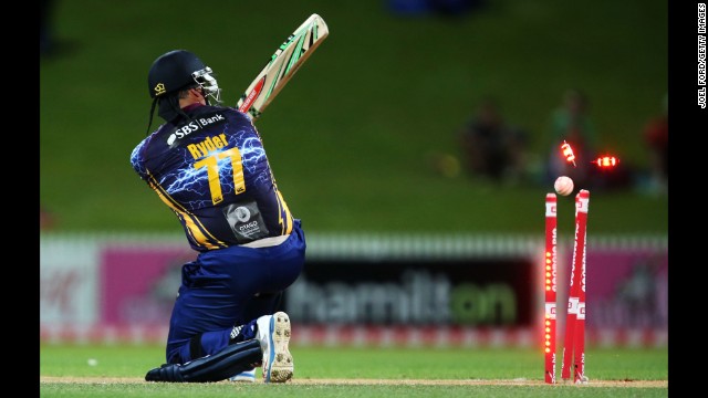 Jesse Ryder of the Otago Volts is bowled out by the Auckland Aces during a Twenty20 cricket match Saturday, November 1, in Hamilton, New Zealand.