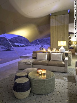Accessible only by light aircraft, Hoanib Skeleton Coast Camp is a secluded tent resort in Namibia's mysterious Skeleton Coast. The 100% solar-powered camp features a swimming pool.