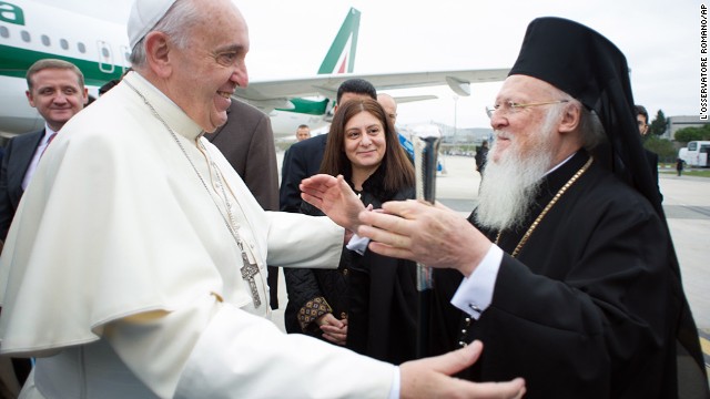 Pope Francis is welcomed by Ecumenical Patriarch Bartholomew I at the Istanbul Ataturk airport on November 29.