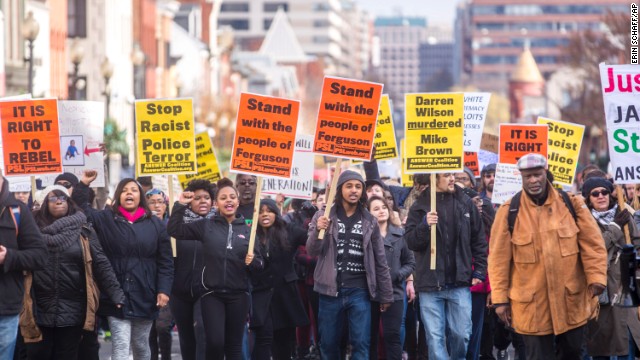 Several hundred people march down M Street in Washington during a Ferguson protest on Saturday, November 29.