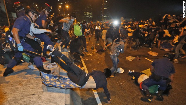 Hundreds of pro-democracy protesters face off with Hong Kong police on November 30. 