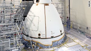 Orion is wrapped in protective panels before being moved to the launch pad on November 10.\n