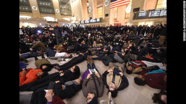 Protesters lie down in Grand Central Station on December 3.