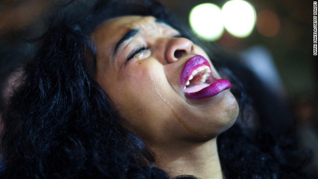 A demonstrator cries at a protest in Philadelphia on December 3.