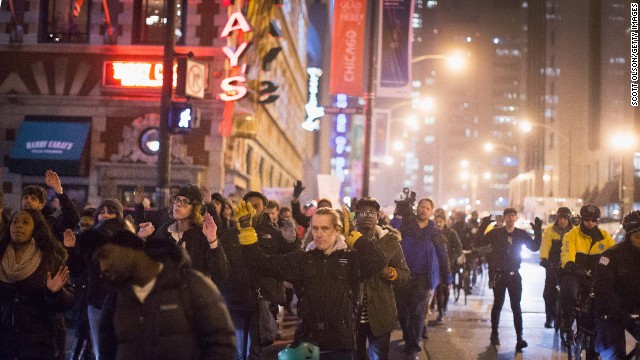Demonstrators march through the Loop in Chicago on December 5.