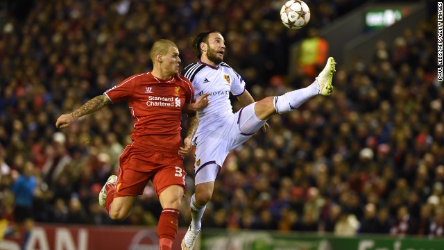 Shkelzen Gashi of Basel and Martin Skrtel of Liverpool endured a fierce contest with both sides desperate to make it through to the knockout phase.