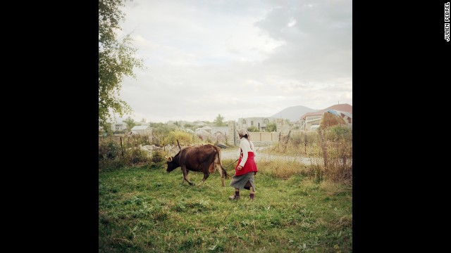 A woman named Cirush fetches her cow in the evening. Her husband and one of her sons work in Russia. Her other son is in the military.