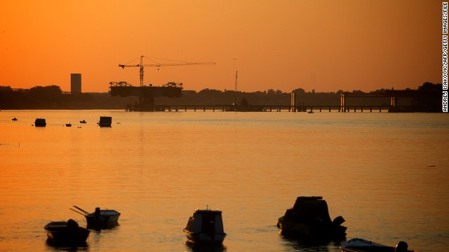 Today Belgrade is stepping up its efforts to rebuild once again. Pictured here, construction work of a new bridge over the Danube on July 23, 2013.