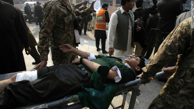 A student is wheeled into a hospital in Peshawar.