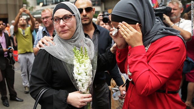 Members of the Muslim community show their respect at Martin Place on December 16.