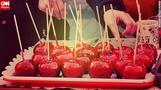 <strong>Candied apples:</strong> Snezana Popovic says <a href='http://ireport.cnn.com/docs/DOC-1195382'>candied apples</a> are an indispensable part of street celebrations in Serbia. She took this photo at the "Street of Open Heart" event which is organized every January 1 at several locations in the Serbian capital of Belgrade. 