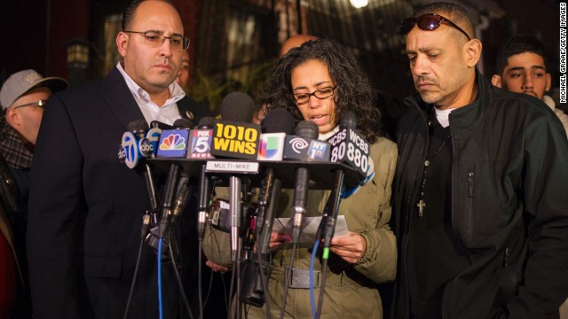 Lucy Ramos, aunt of slain police officer Rafael Ramos, speaks at a news conference in front of Ramos' childhood home on December 21.