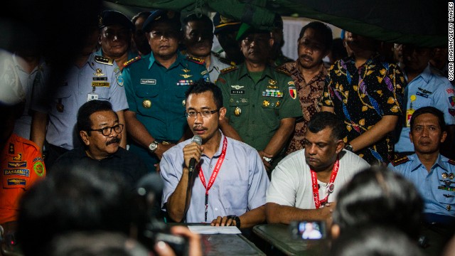 Sunu Widyatmoko, CEO of Indonesia AirAsia, gives a press conference in Surabaya, Indonesia, announcing that the flight lost contact with air traffic control.