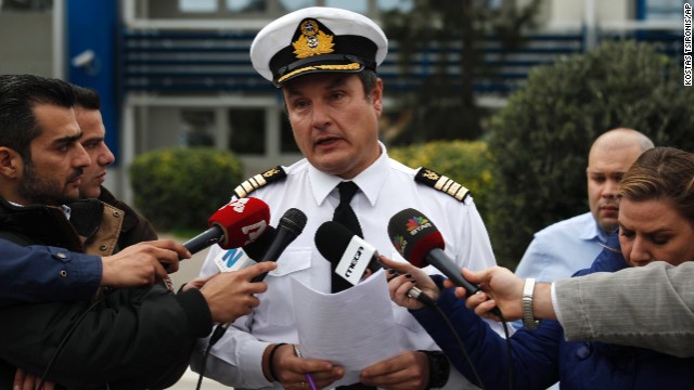 Greece's Coast Guard spokesman Nikolaos Lagadianos delivers a statement concerning the fire to the media in Piraeus port. 