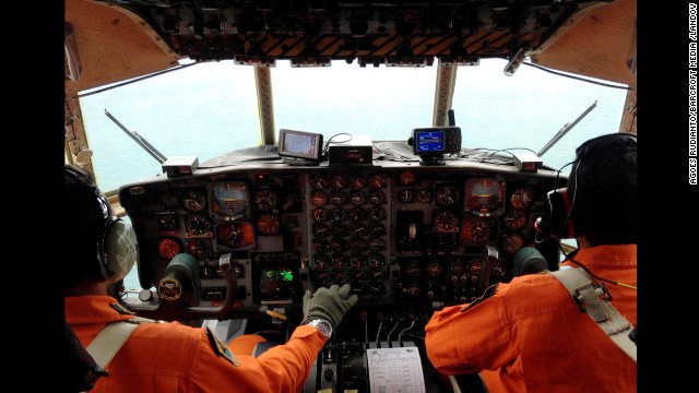 Military personnel perform a search operation to the point where the jetliner lost contact.