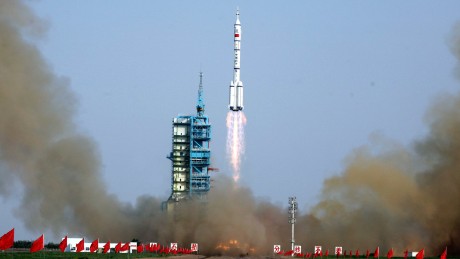 The Shenzhou-9 -- China&#39;s fourth manned space mission -- blasts off at 1037 GMT from the Jiuquan space base, northwest China&#39;s Gansu province in the remote Gobi desert on June 16, 2012.