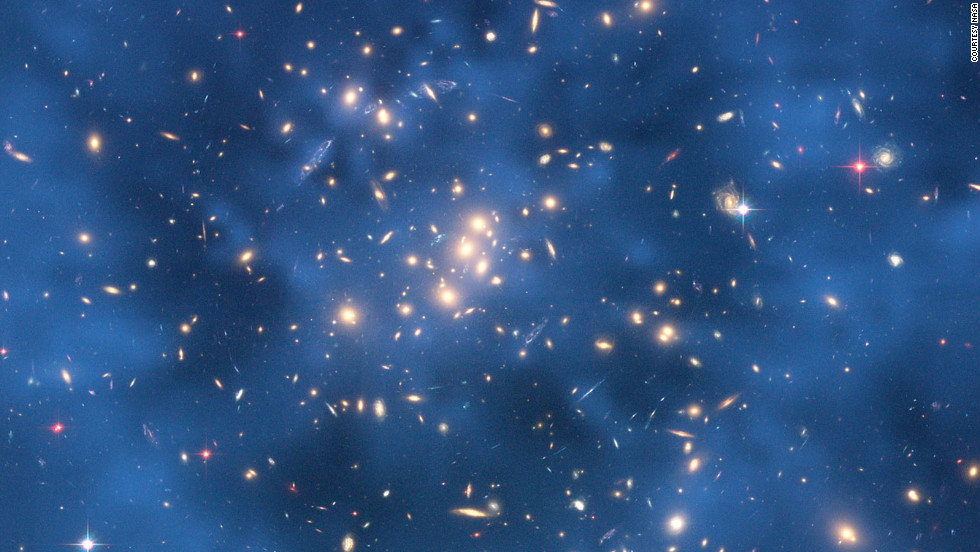 This image from the Hubble Space Telescope indicates that a huge ring of dark matter likely exists surrounding the center of CL0024+17 that has no normal matter counterpart.