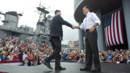 US Republican presidential candidate and former Massachusetts Governor Mitt Romney(R) announces Wisconsin Representative Paul Ryan as his vice presidential running mate during a campaign rally at the Nauticus Museum after touring the USS Wisconsin in Norfolk, Virginia, August 11, 2012. Romney and his new running mate embark on the first day of a 4-day bus trip that will take the White House hopefuls to 4 key swing states, Virginia, North Carolina, Florida and Ohio. AFP PHOTO / Saul LOEB (Photo credit should read SAUL LOEB/AFP/GettyImages)