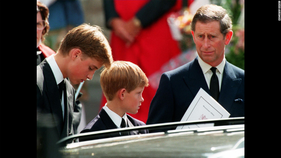 Left to right: Princes William, Harry and their father Prince Charles wait in front of the Westminster Abbey in London after the funeral ceremony of Diana Princess of Wales on September 6, 1997.