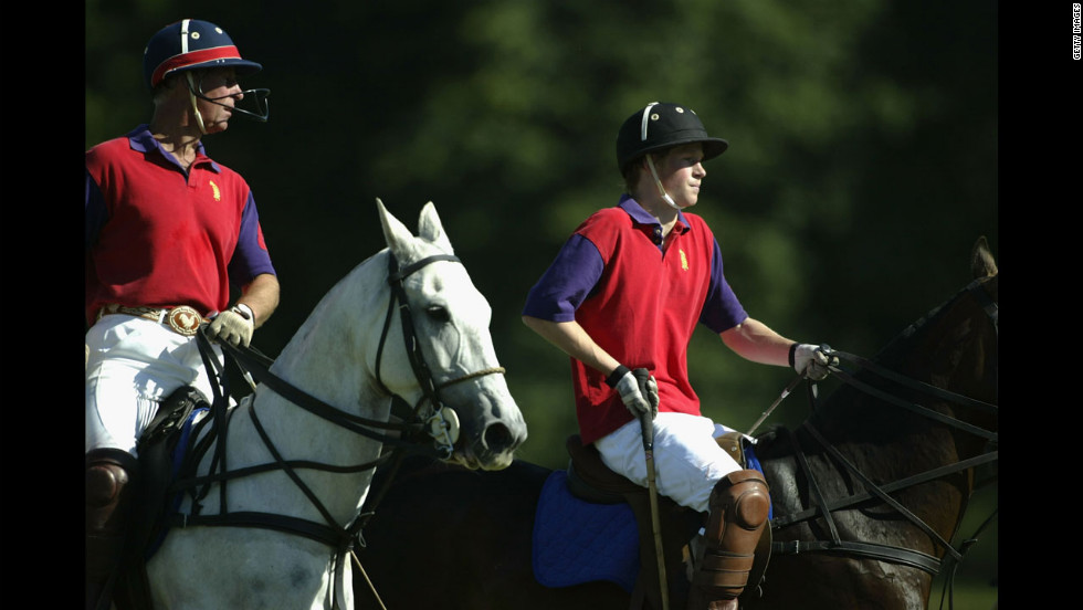 Britain&#39;s Prince Harry, right, and his father The Prince Of Wales play polo for The BFF/Highgrove Team in a match for The Indian Cavalry Polo Trophy in Tidworth, England, on July 12, 2003.