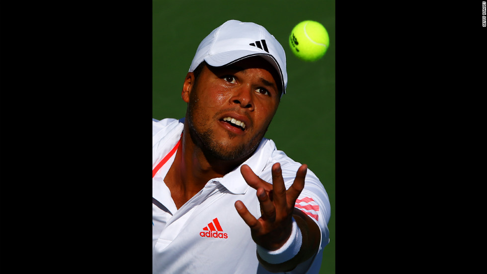 France's Jo-Wilfried Tsonga serves the ball against Karol Beck of Slovakia.