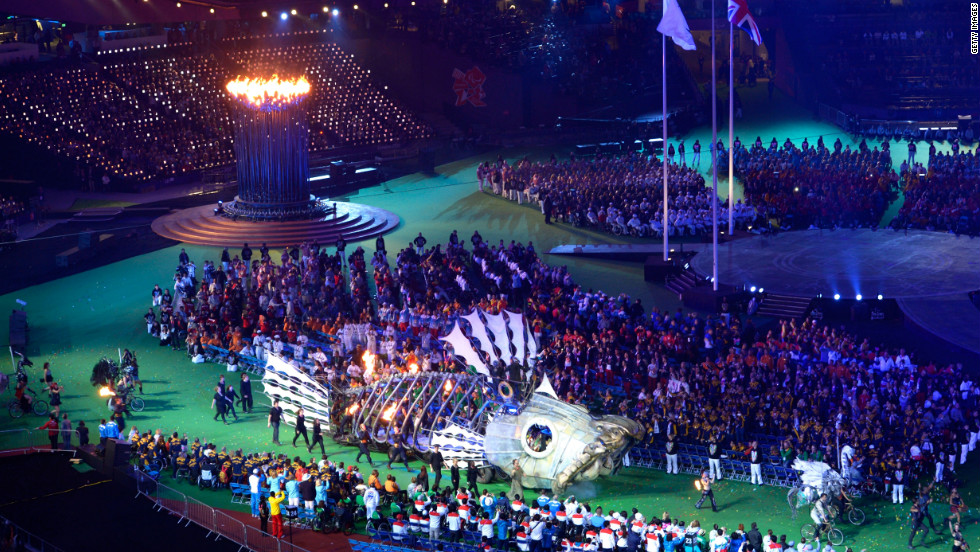 A mechanical fish circles the arena.