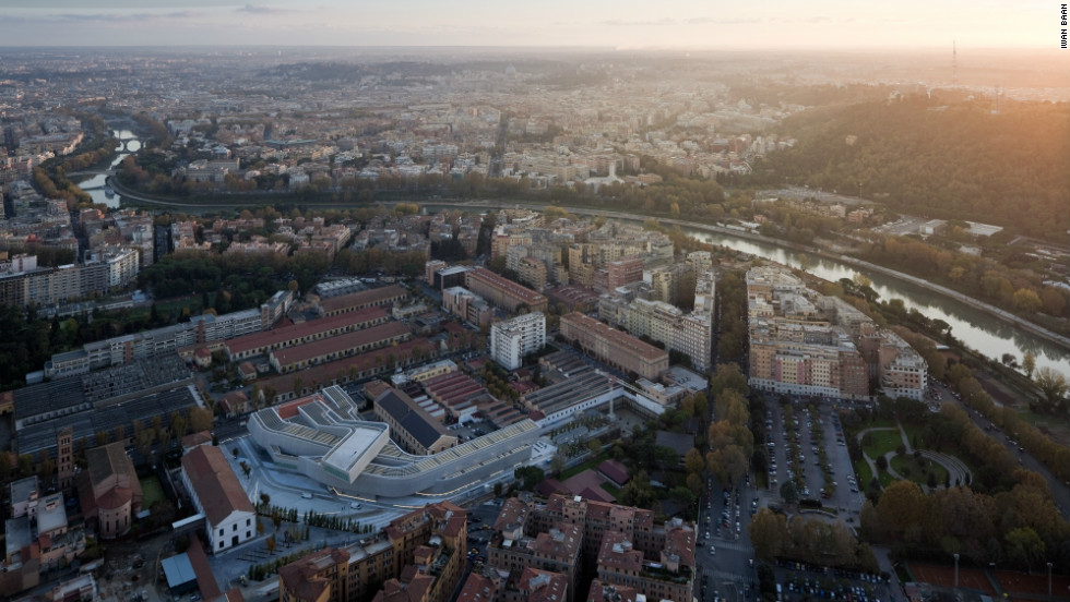 The building is built on the former military grounds in northern Rome. Highlights from the concrete heavy building include its use of natural light, glass ceilings, large windows and open spaces. 