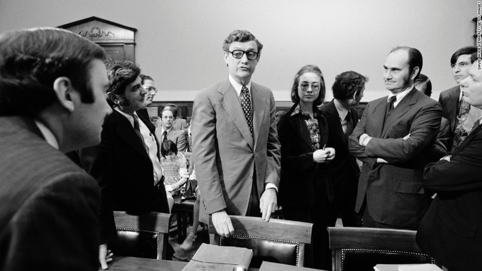 Rodham, center, a lawyer for the Rodino
Committee, and John Doar, left, chief counsel for the committee, bring
impeachment charges against President Richard Nixon in the Judiciary
Committee hearing room at the U.S. Capitol in 1974. 