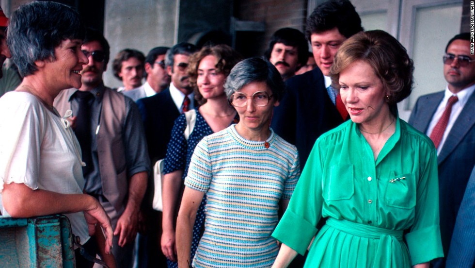 Arkansas Gov. Bill Clinton helps first lady Rosalynn Carter on a campaign swing through Arkansas in June 1979. Also seen in the photo is Hillary Clinton, center background.